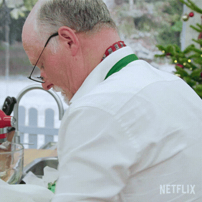 Man In White Shirt Washing Dishes With Netflix Logo GIF