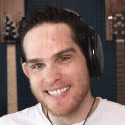Man In White Shirt With Brown Shoulder Bag Giving Middle Finger GIF
