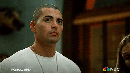 Man In White Shirt With #Chicagopd GIF