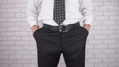 Man In White Shirt With Hands In Pockets GIF
