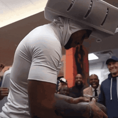 Man In White Shirt With Hooded Helmet GIF