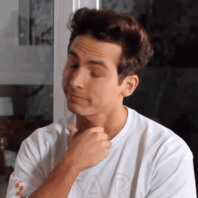 Man In White Shirt With Letter A GIF
