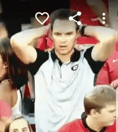 Man In White Shirt With Letter G GIF