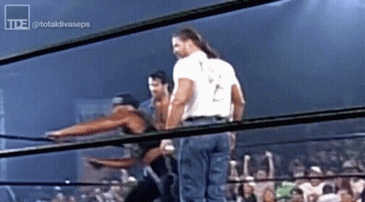 Man In White Shirt With Letter T In Wrestling Ring GIF