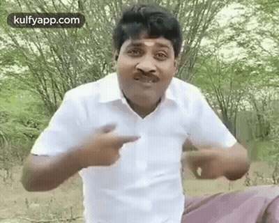Man In White Shirt With Mustache Pointing At Camera GIF