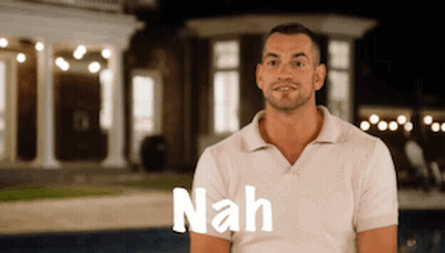 Man In White Shirt With Nah Text At House GIF