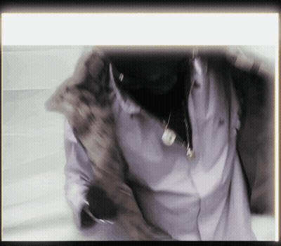 Man In White Shirt With Necklace Letter N GIF