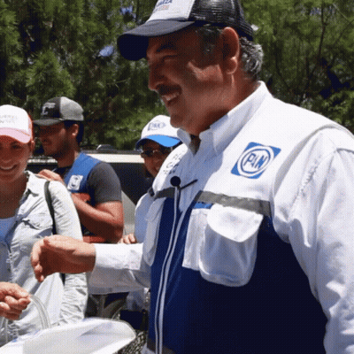 Man In White Shirt With Pn Logo GIF