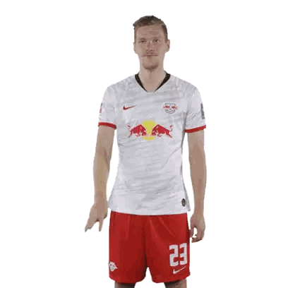 Man In White Shirt With Red Bulls And 23 Sticker