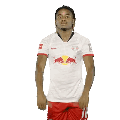 Man In White Shirt With Red Bulls Sticker