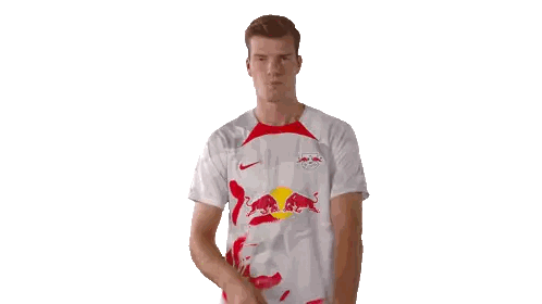 Man In White Shirt With Red Bulls Sticker