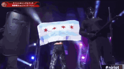 Man In White Shirt With Red Stars On Stage GIF