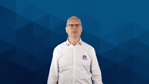 Man In White Shirt With Shield GIF