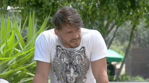 Man in White Shirt with Tiger