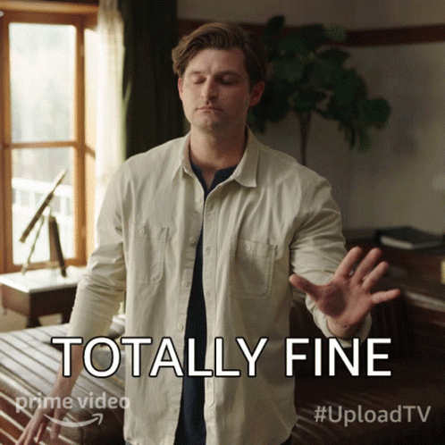 Man In White Shirt With Totally Fine Sign GIF
