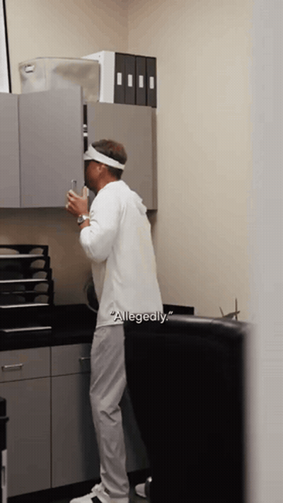 Man In White Shirt With Word Allegedly GIF