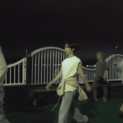 Man In White Sleeveless Shirt Walking GIF