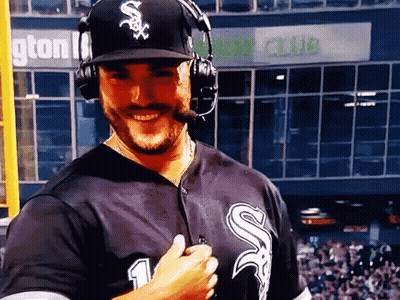Man In White Sox Hat And Headphones GIF