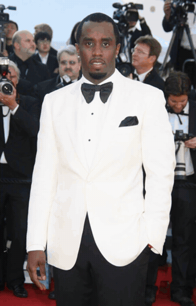 Man In White Suit And Black Bow Tie GIF