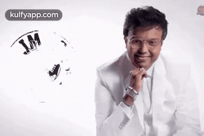 Man In White Suit And Glasses Smiling GIF