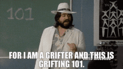 Man In White Suit And Hat In Front Of Chalkboard 101 GIF