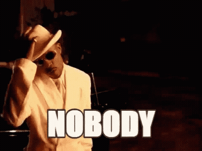 Man In White Suit And Hat Sitting Says Nobody GIF