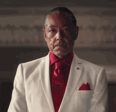 Man In White Suit And Red Tie GIF