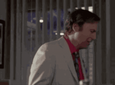 Man In White Suit And Red Tie GIF