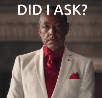 Man in White Suit and Red Tie Asking Did I Ask