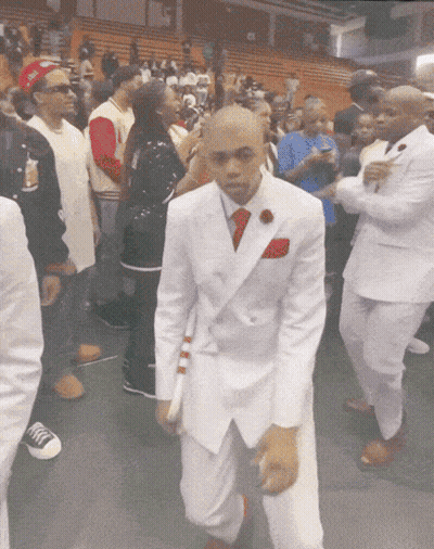 Man In White Suit And Red Tie Dancing GIF
