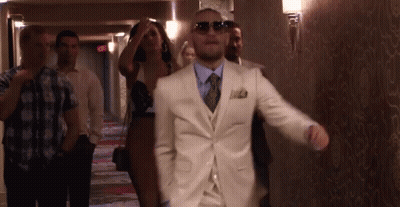 Man In White Suit Dancing GIF