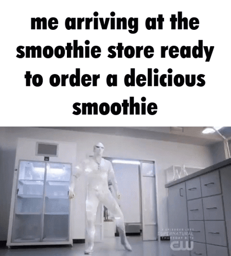 Man In White Suit Dancing In Front Of Smoothie Store GIF