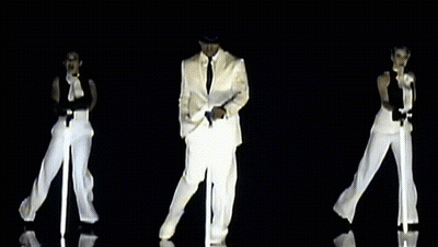 Man In White Suit Dancing With Two Women GIF