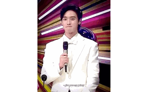 Man In White Suit Holding Microphone Sticker
