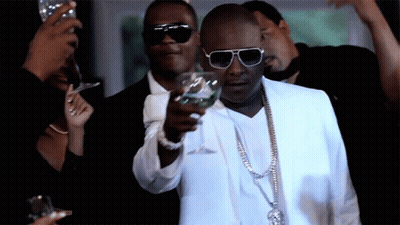 Man In White Suit Holding Water GIF