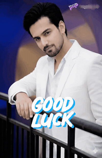 Man In White Suit Leaning On Railing Saying Good Luck GIF