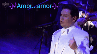 Man In White Suit Singing Amor Amor GIF