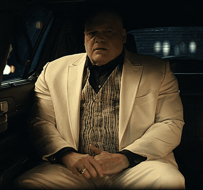Man In White Suit Sitting In Car GIF