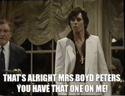Man In White Suit Talking To Another Man GIF