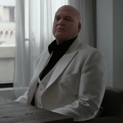 Man In White Suit With Eyes Closed GIF