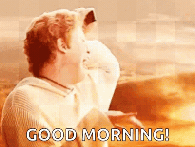 Man In White Sweater Saying Good Morning GIF