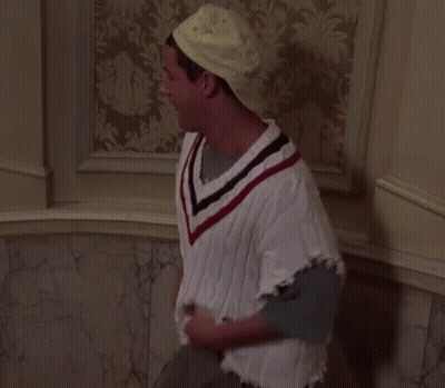 Man In White Sweater With Red Black And Blue Striped V-Neck GIF