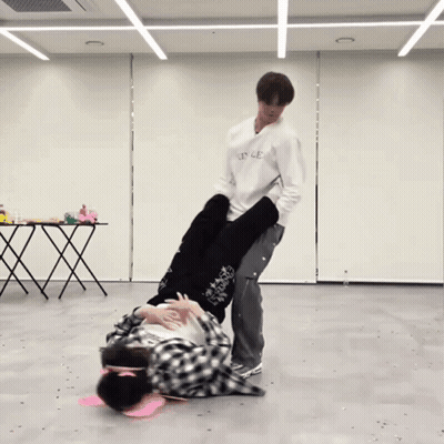 Man In White Sweatshirt Saying L'Ence Carrying Man Upside Down GIF