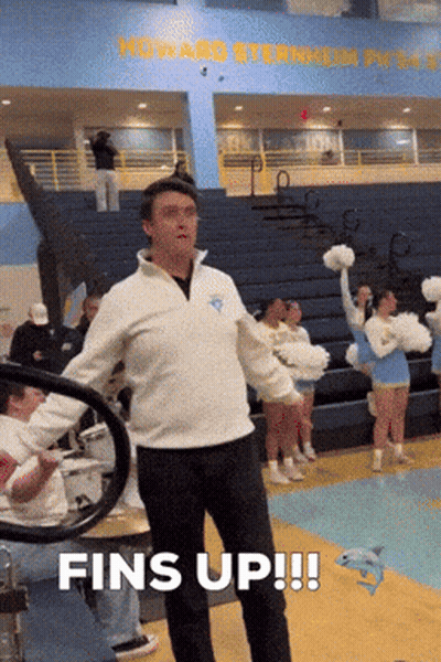Man In White Sweatshirt Says Fins Up With Cheerleaders GIF