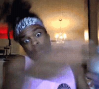 Man In White T-Shirt And Blue Hat Smiling Dancing GIF