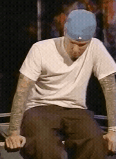 Man In White T-Shirt And Blue Hat GIF
