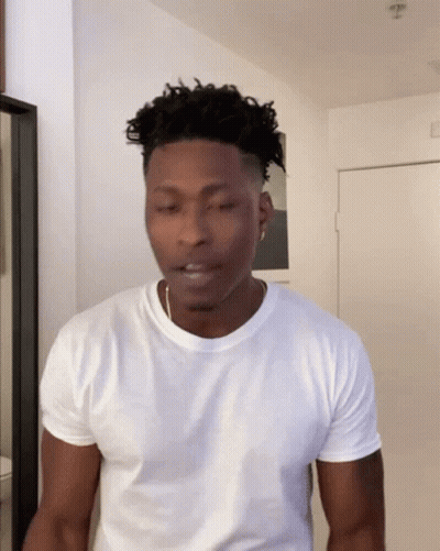 Man In White T-Shirt At Door GIF