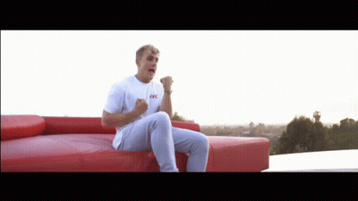 Man In White T-Shirt Fist Pumping GIF