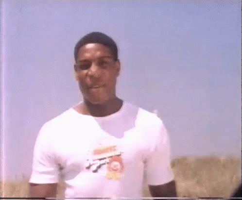 Man In White T-Shirt Giving Thumbs Up GIF