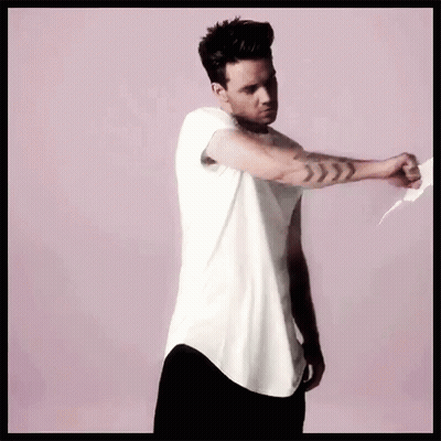 Man In White T-Shirt Holding Paper Saying Down GIF